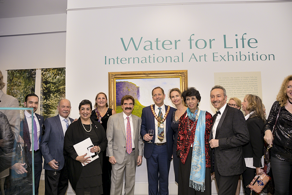 The Patron of the Water for Life, International Art Exhibition, First Edition, the Mayor of Niagara Falls, Jim Diodati, The Honorable, Wayne Gates, Member of Provincial Parliament for Niagara Falls, wih some of the participating artists.