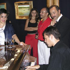 VIP Opening of the Passion for Life solo exhibition at the Hotel Presidente Intercontinental, Cancún Resort Art Gallery. Angelina Herrera, Ricardo Corona at the piano, and Antoine Gaber.