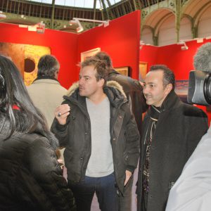 Il famoso attore francese M. Stéphane Henon con il pittore impressionista Antoine nel Grand Palais.