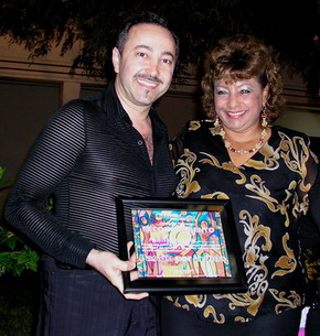 The Representative and Secretary of the Governor of State of Quintana Roo presented to impressionist painter and cancer researcher, Antoine Gaber, a recognition for his cultural contribution and dedication in promoting the arts while supporting cancer awareness in the State of Quintana Roo.